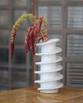 Styled image featuring Soft Skills Cloud Twisted Shell Vessel.