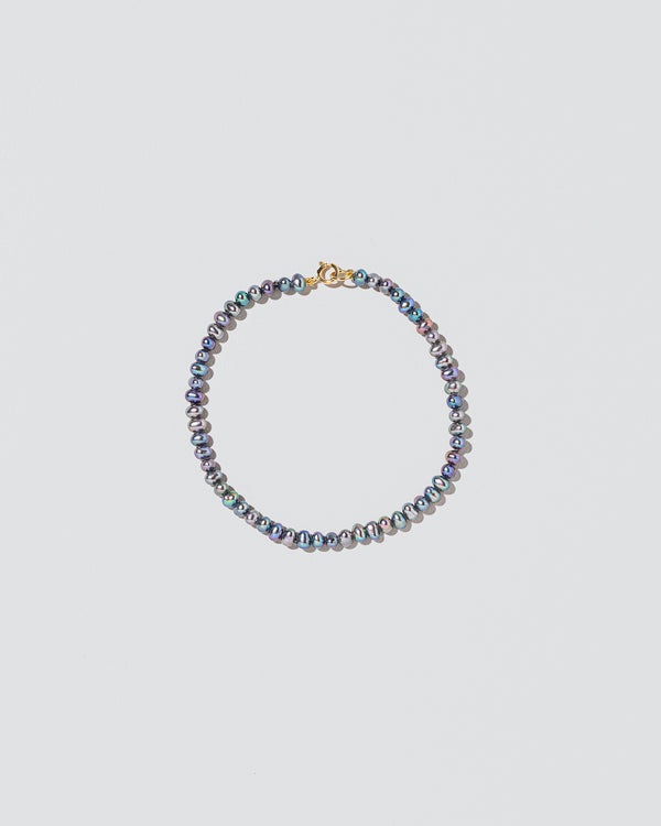  Seed Pearl Bracelet on light color background.