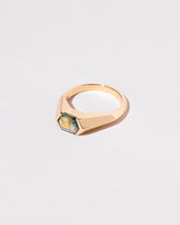 View from the side of the Caelum Ring on light color background.