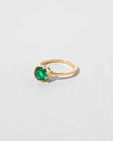 Sun & Moon Ring - Emerald on light color background.