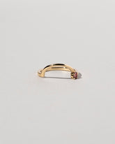 Yellow Gold Spinel Half Hoop Band on light color background.