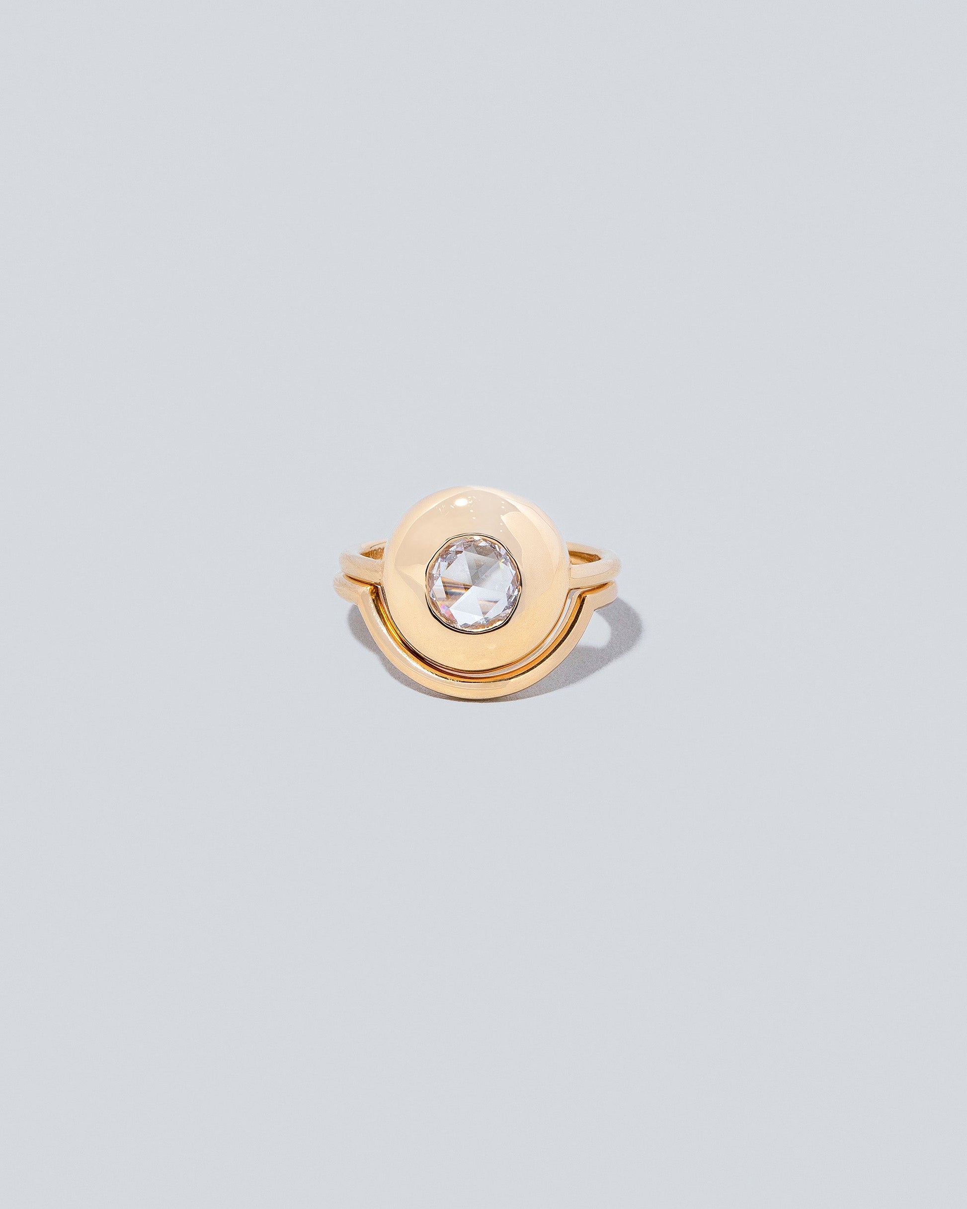 Front view of Exposition Ring with Exposition Band on light color background.