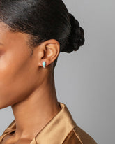 Divine Protection Earrings on model.