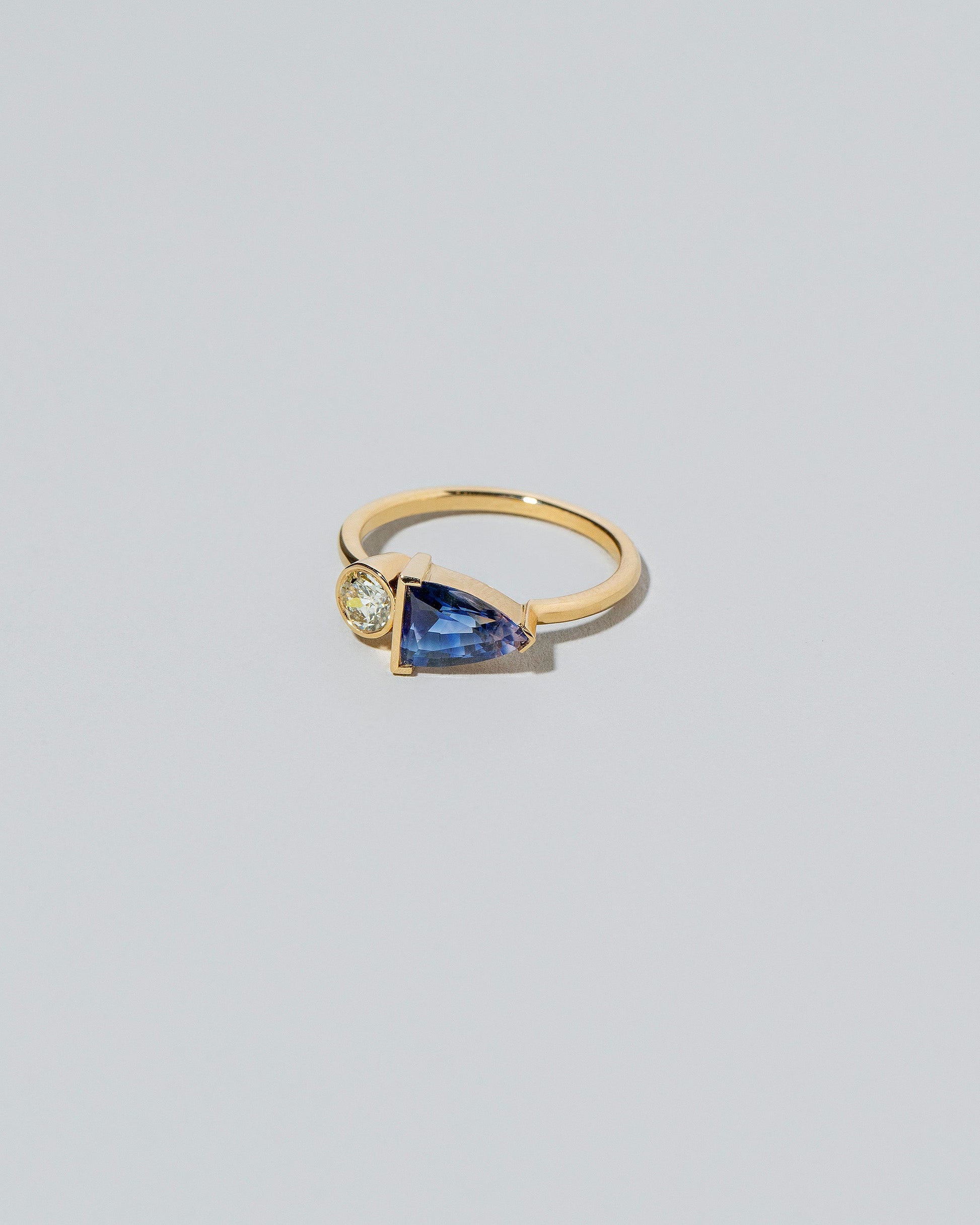 Greenwood Ring on light color background.