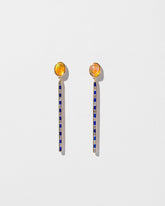 Ethiopian Opal Transformation Earrings on light color background.