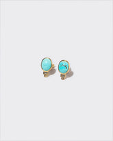 Life-Giver Earrings on light color background.