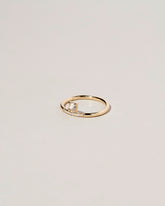 Stacked Ring - White Diamond on light color background.