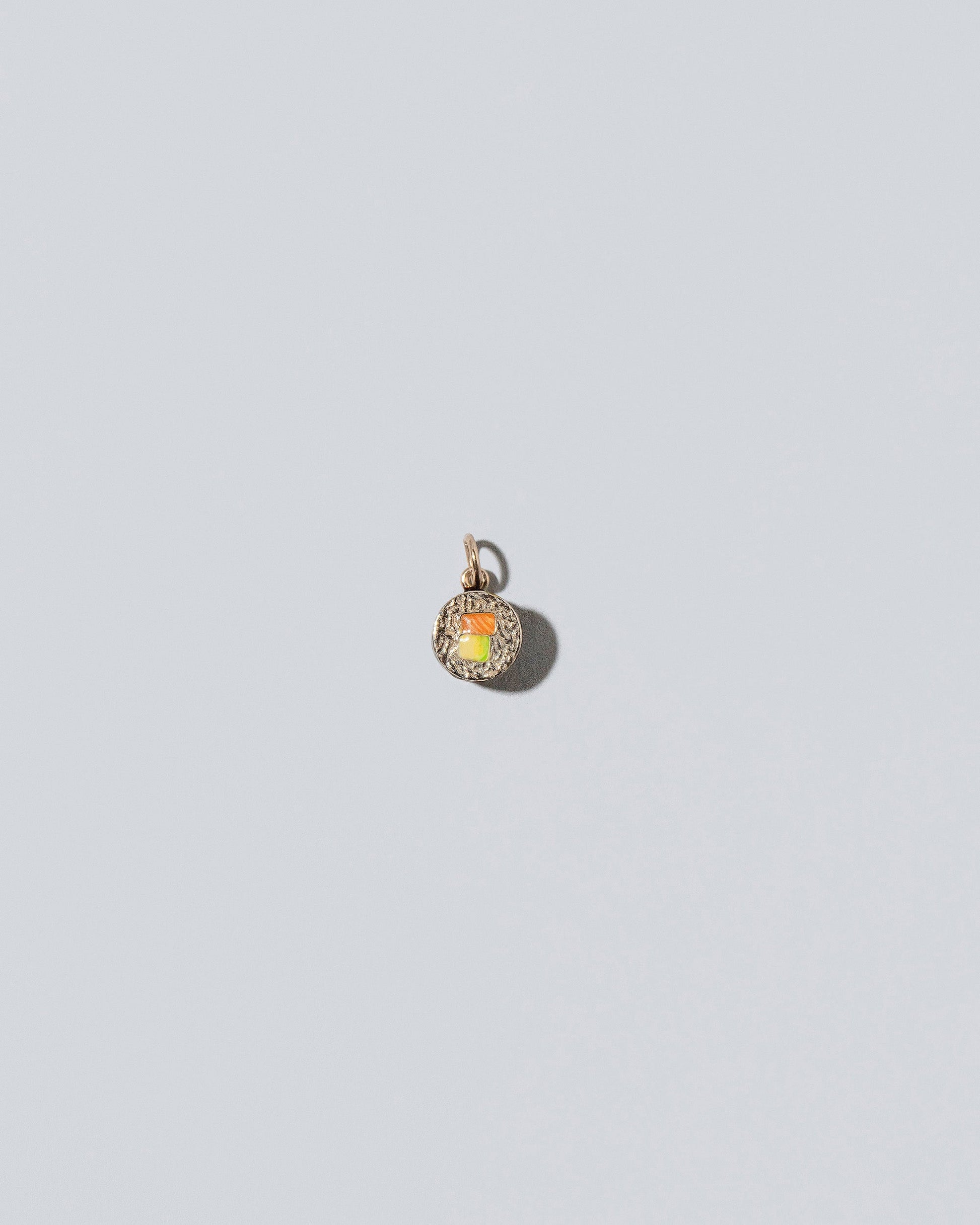 Sushi Charms on light color background.