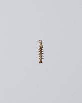 Fish Bone Charm  on light colored background