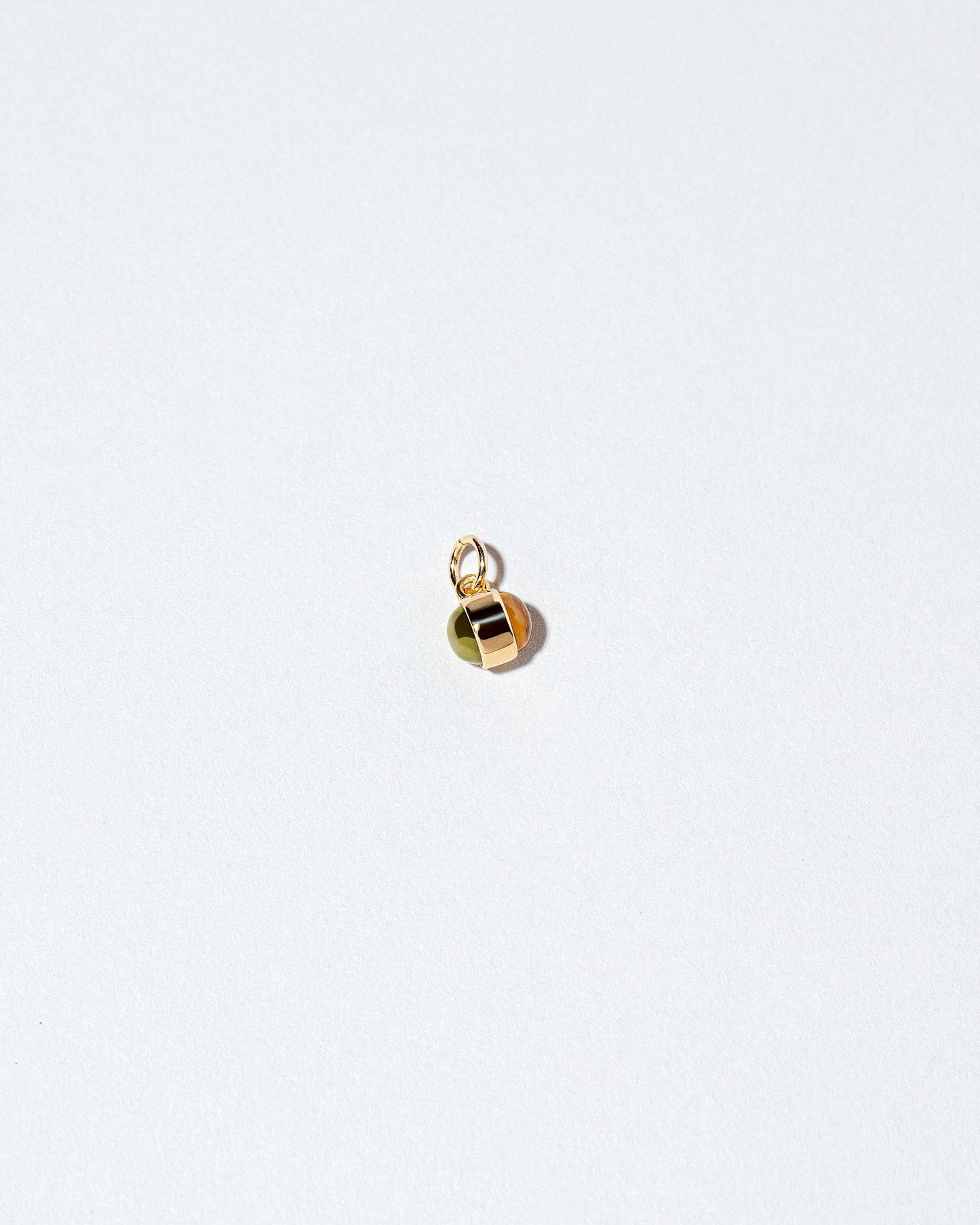 Birthstone Charm on light color background.