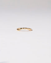  Mini Curve Band - Single Stone on light color background.