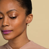 product_details::Thin Segmented Hoops on model.