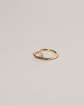 Stacked Ring - White & Black Diamond on light color background.