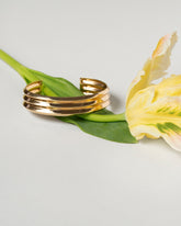 Accordion Cuff on light color background.