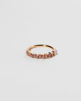 Eleven Trillion Ring - Peach Sapphire on light color background.