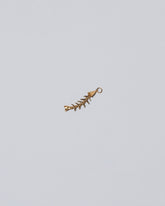 Fish Bone Charm  on light colored background