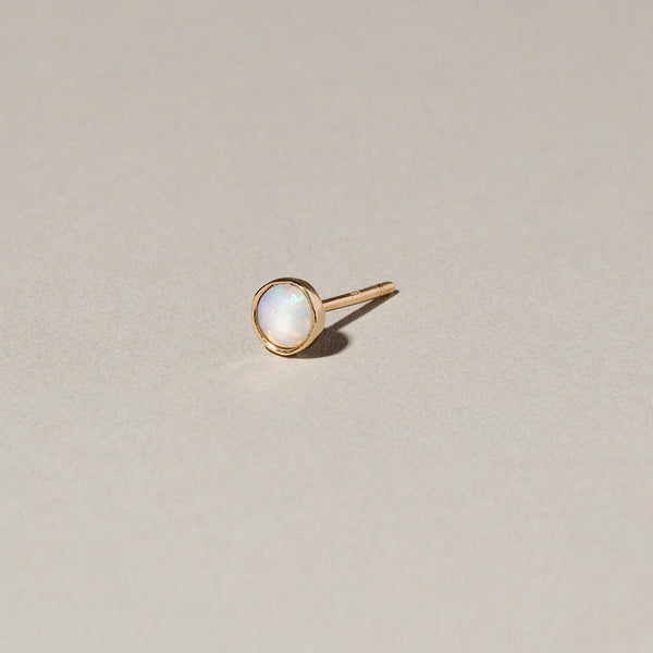 product_details:: Birthstone Single Stud on light color background.