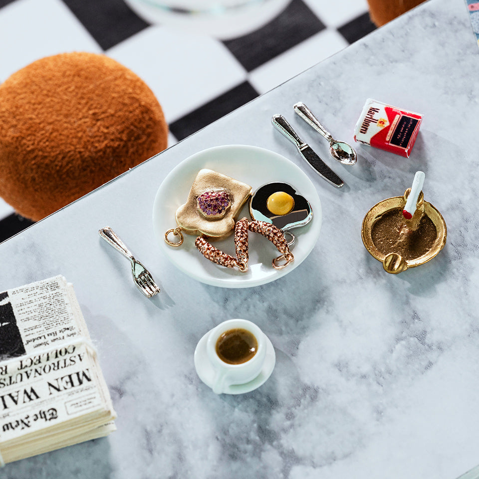 product_details::Styled photo featuring Sausage Link Charm