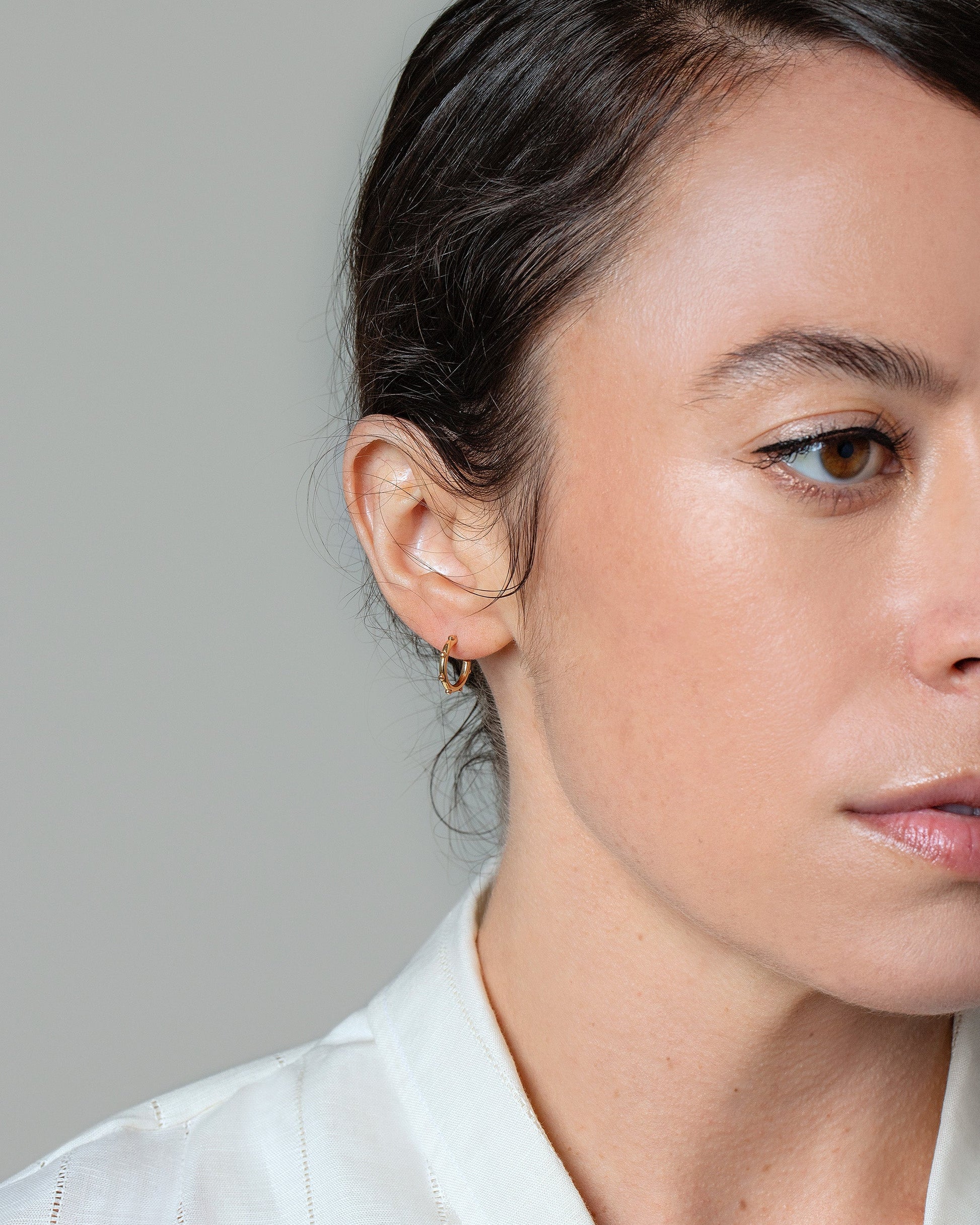 Abacus Hoop Earrings on model.