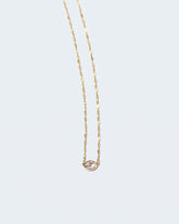 Bloom Necklace on light color background.