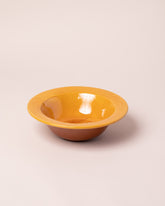 La Ceramica Vincenzo Del Monaco Caramel Yellow First Course Bowl on light color background.