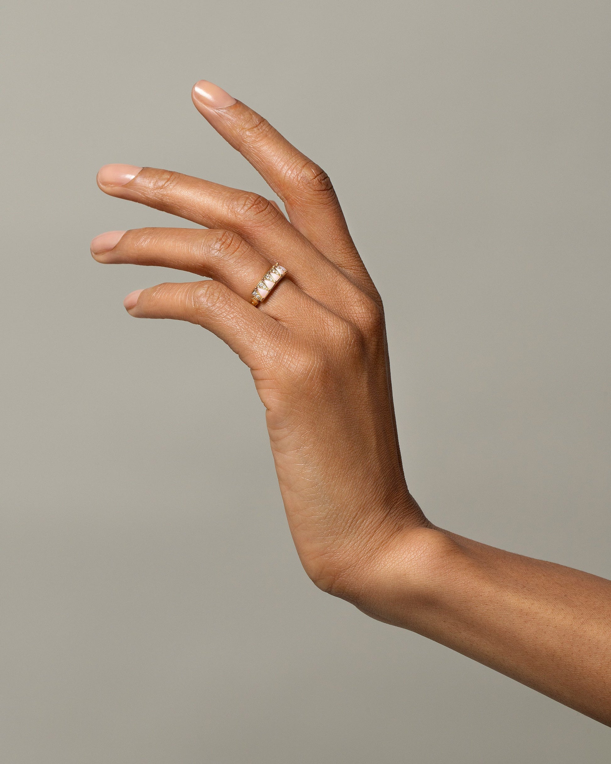 Five Triangle Ring - Pink Opal on model.