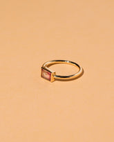 View from the side of the Pink & White Tourmaline Ring on light color background.