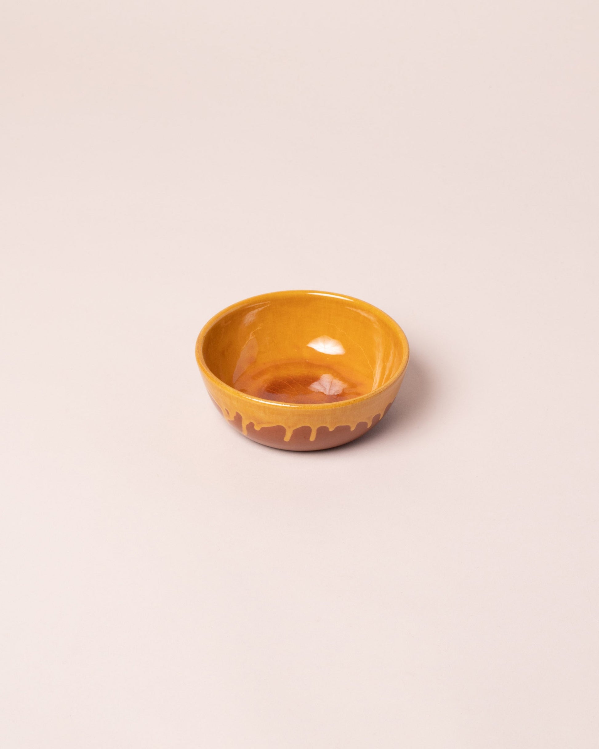 La Ceramica Vincenzo Del Monaco Caramel Yellow Cereal Bowl on light color background.