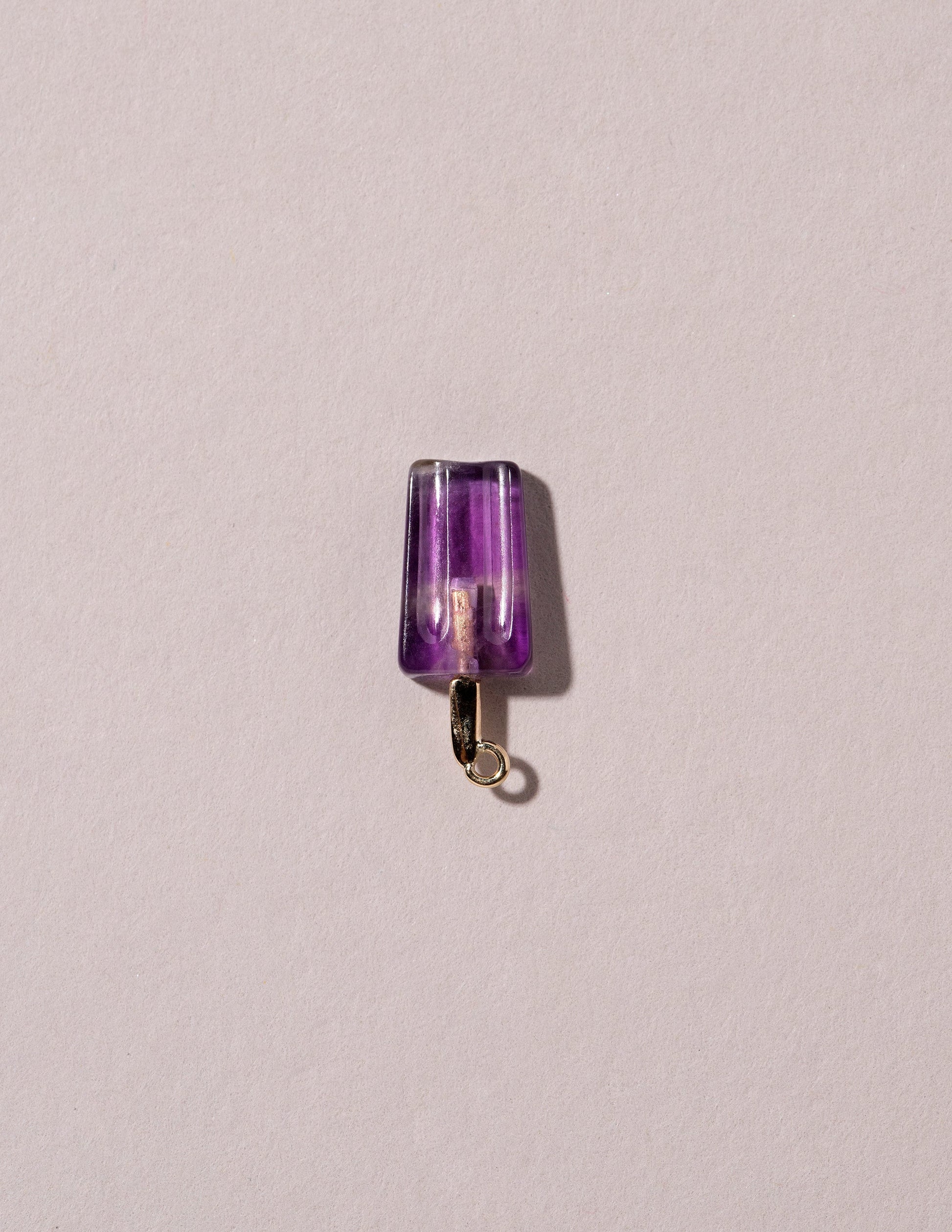 Popsicle Charm - Grape on light color background.
