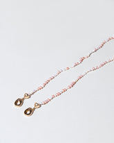 Convertible Optical Chain on light color background.