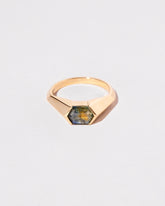 Caelum Ring on light color background.