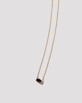 Up Necklace on light color background.