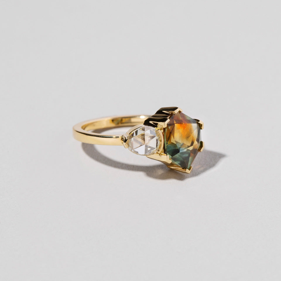 product_details:: Kaleidoscope Sapphire Geometric Ring on light color background.