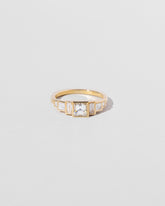 Calliope Ring on light color background.