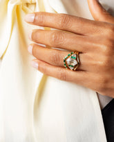Gold Baguette Emerald High Peak Band, Cosmic Realm Ring and Gold Square High Peak Band on model.