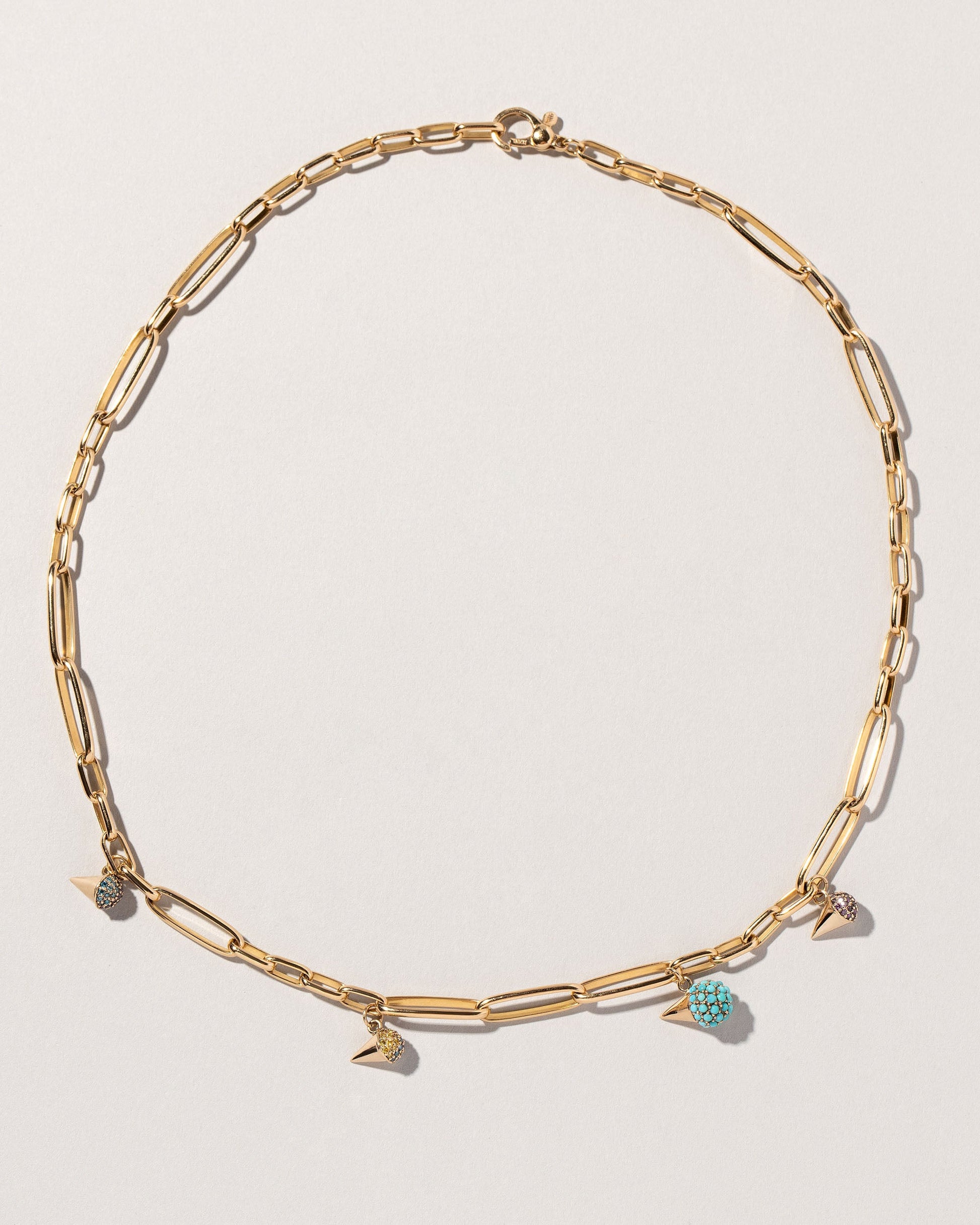 Sno Cone Charm - Sour Grape on light color background.