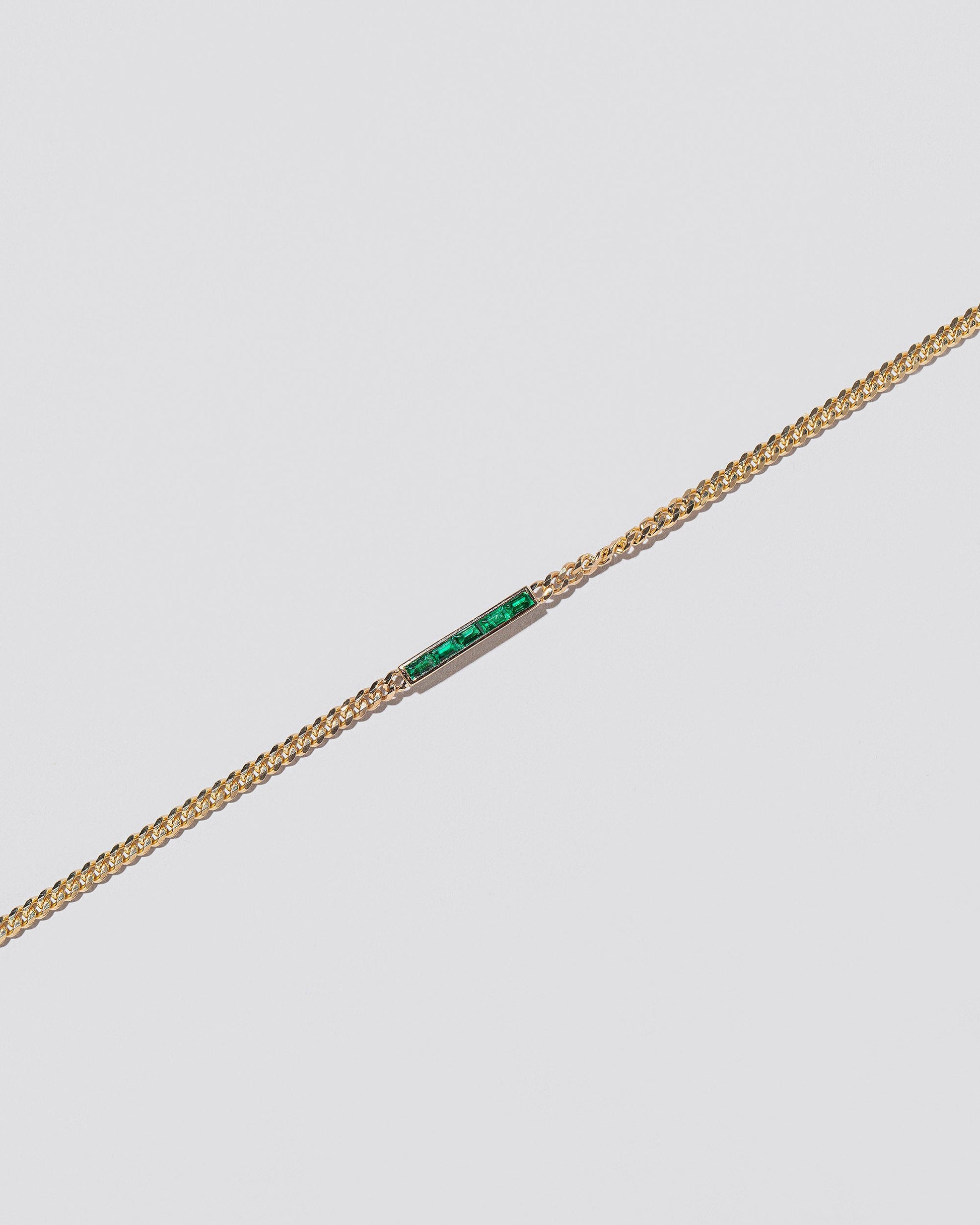 Identity Chain Necklace on light colored background.