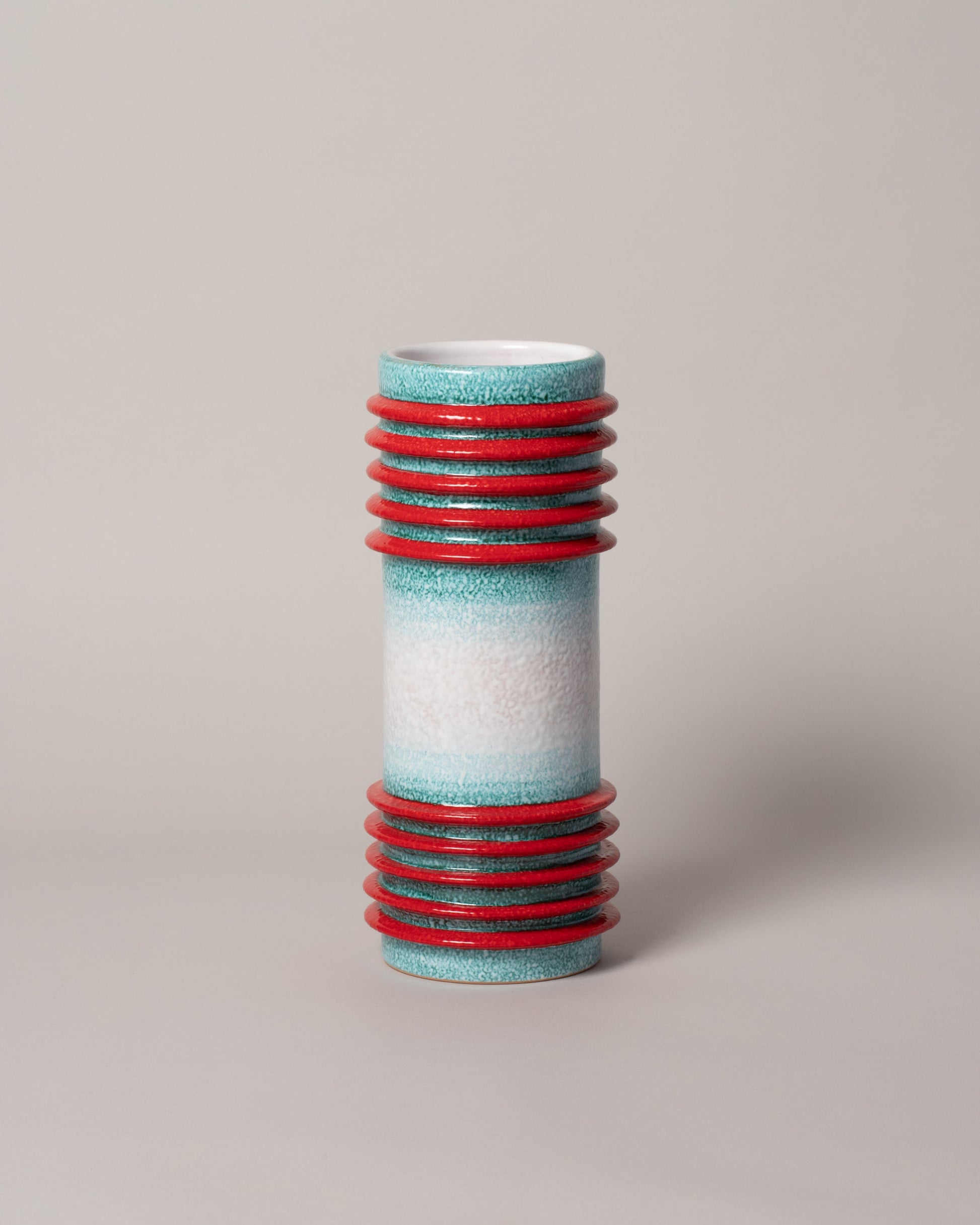 Mazzotti 1903 Motorato Assolutoo Vase on light colored background.