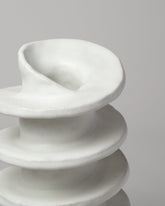 Detail view of Soft Skills Cloud Twisted Shell Vessel on light color background.