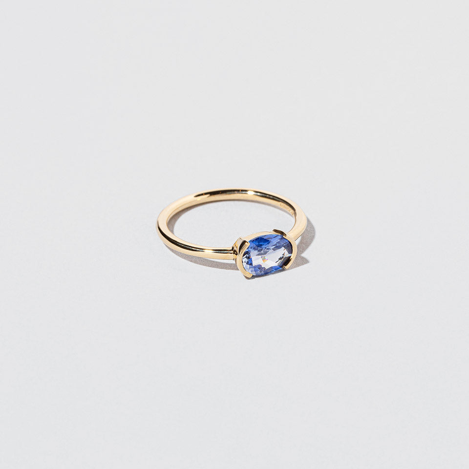 product_details::Closeup details of the Interstellar Ring on light color background.