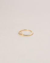 Stacked Ring - Triangle on light color background.