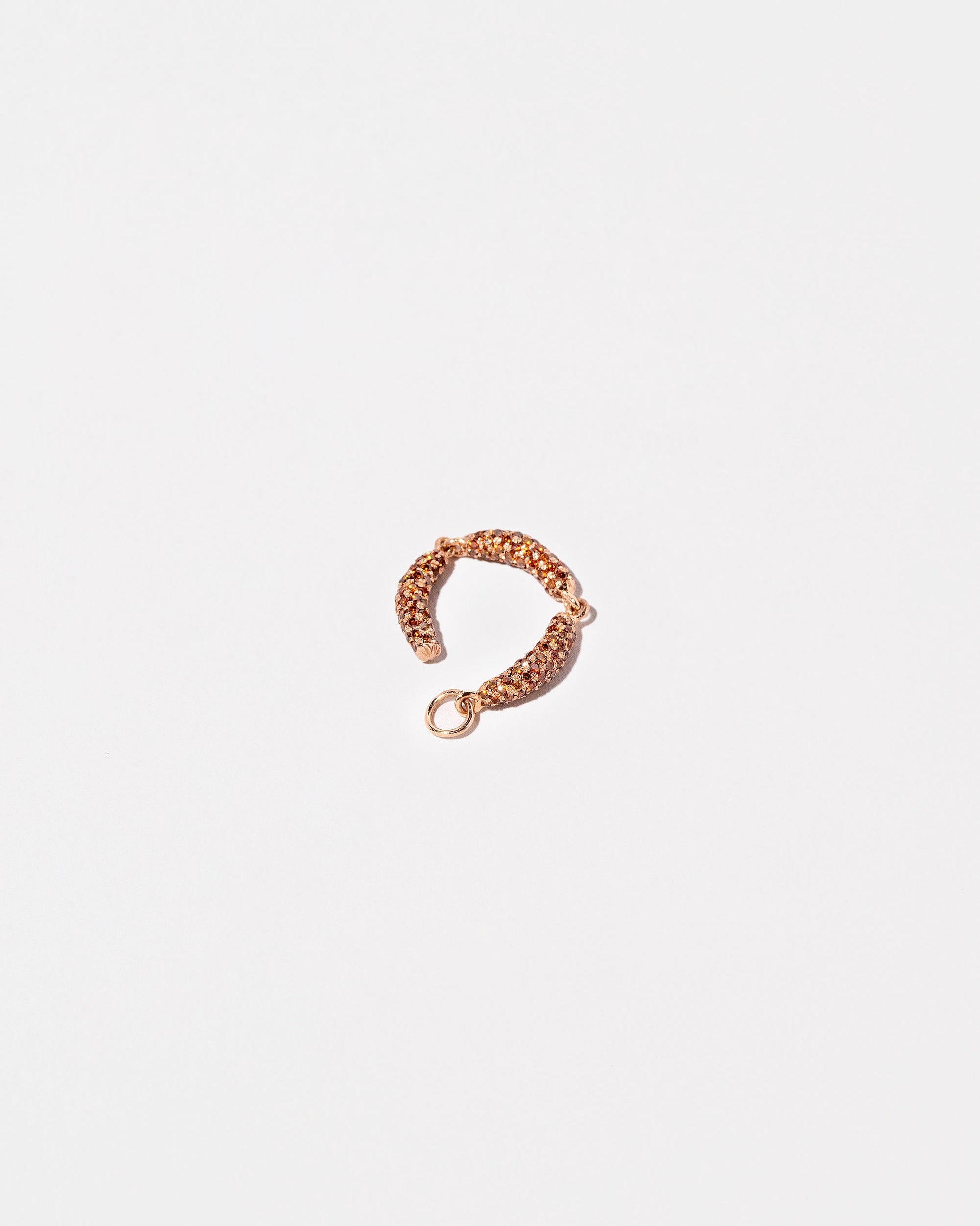 Sausage Links Charm on light color background.