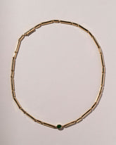 Kinetic Necklace - Made to Order on light color background.