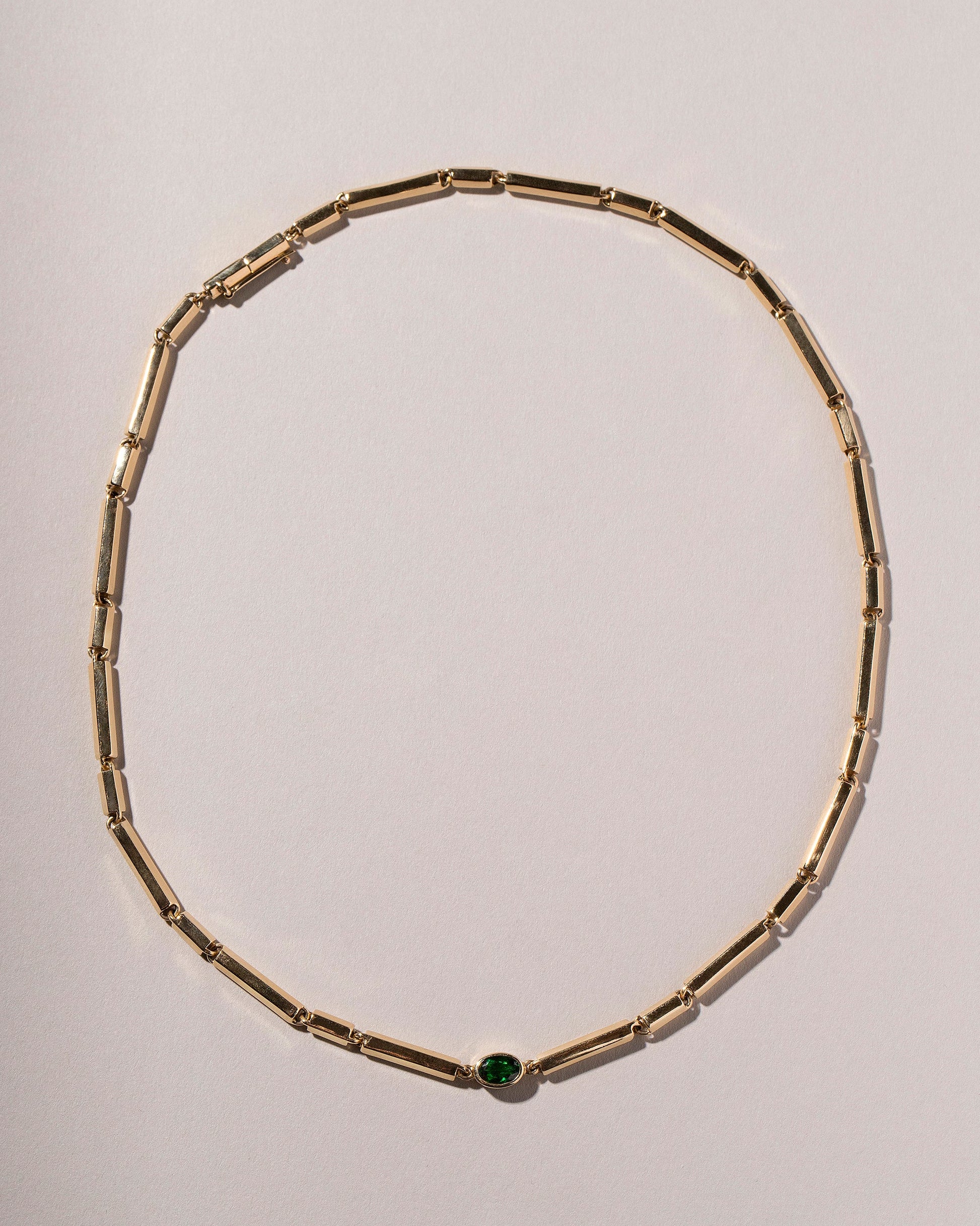 Kinetic Necklace - Made to Order on light color background.