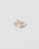 Inner Realm Ring on light color background.