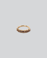 Eleven Trillion Ring - Cognac Diamonds on light color background.