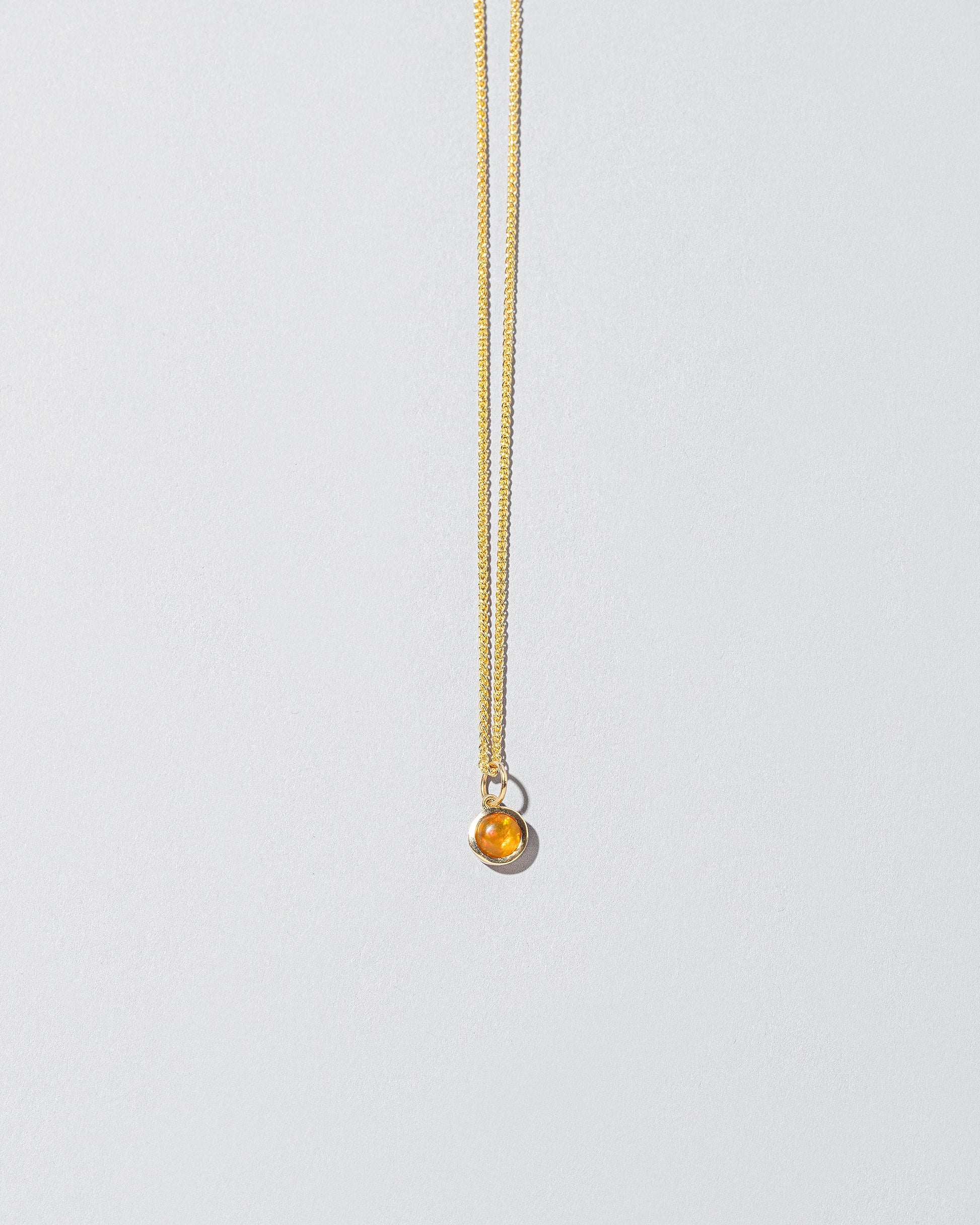 Mars Pendant on light color background.
