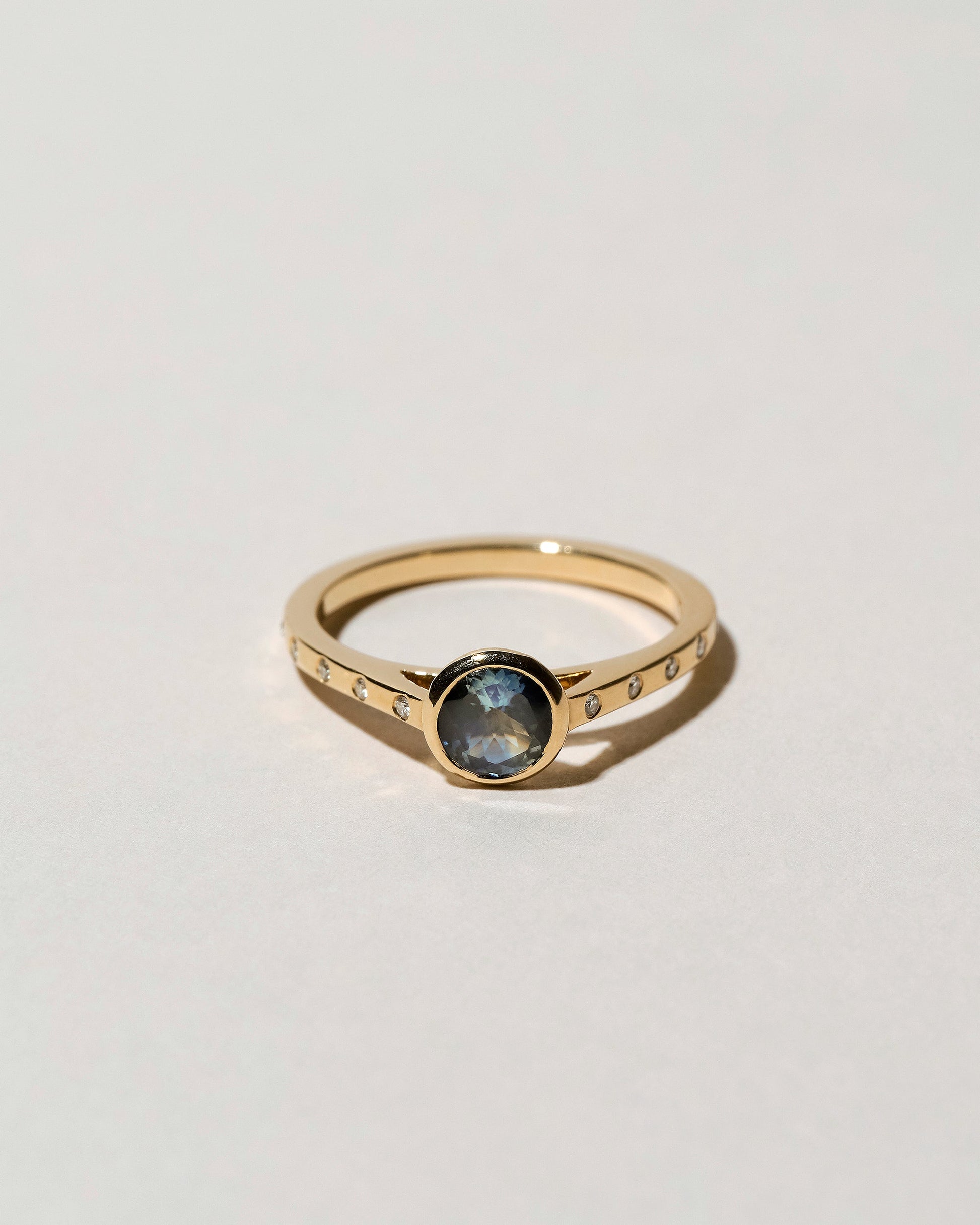 Calatrava Ring - Blue Sapphire on light color background.