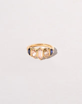 Larkspur Ring on light color background.