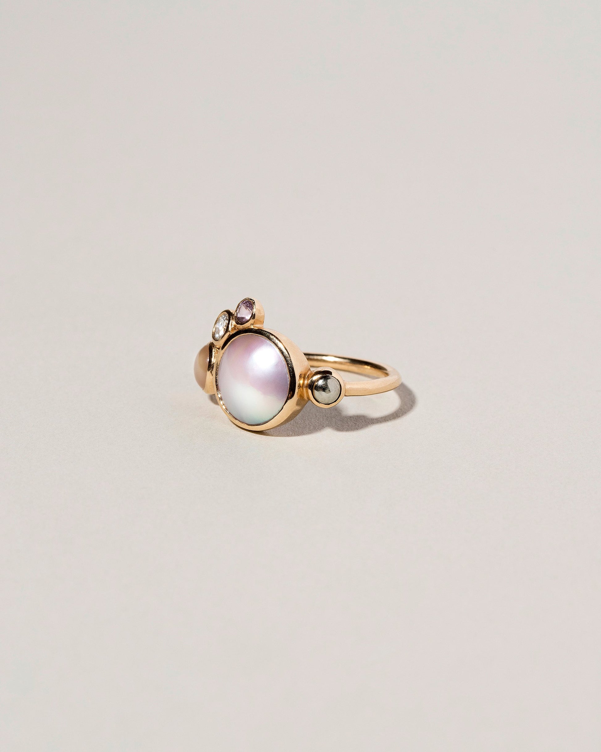 Bubble Cluster Ring on light color background.